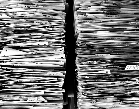 stacks of paper in an office